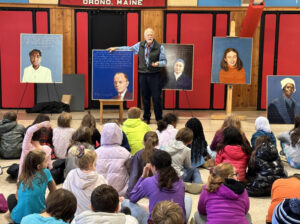 Robert Shetterly with Orono students